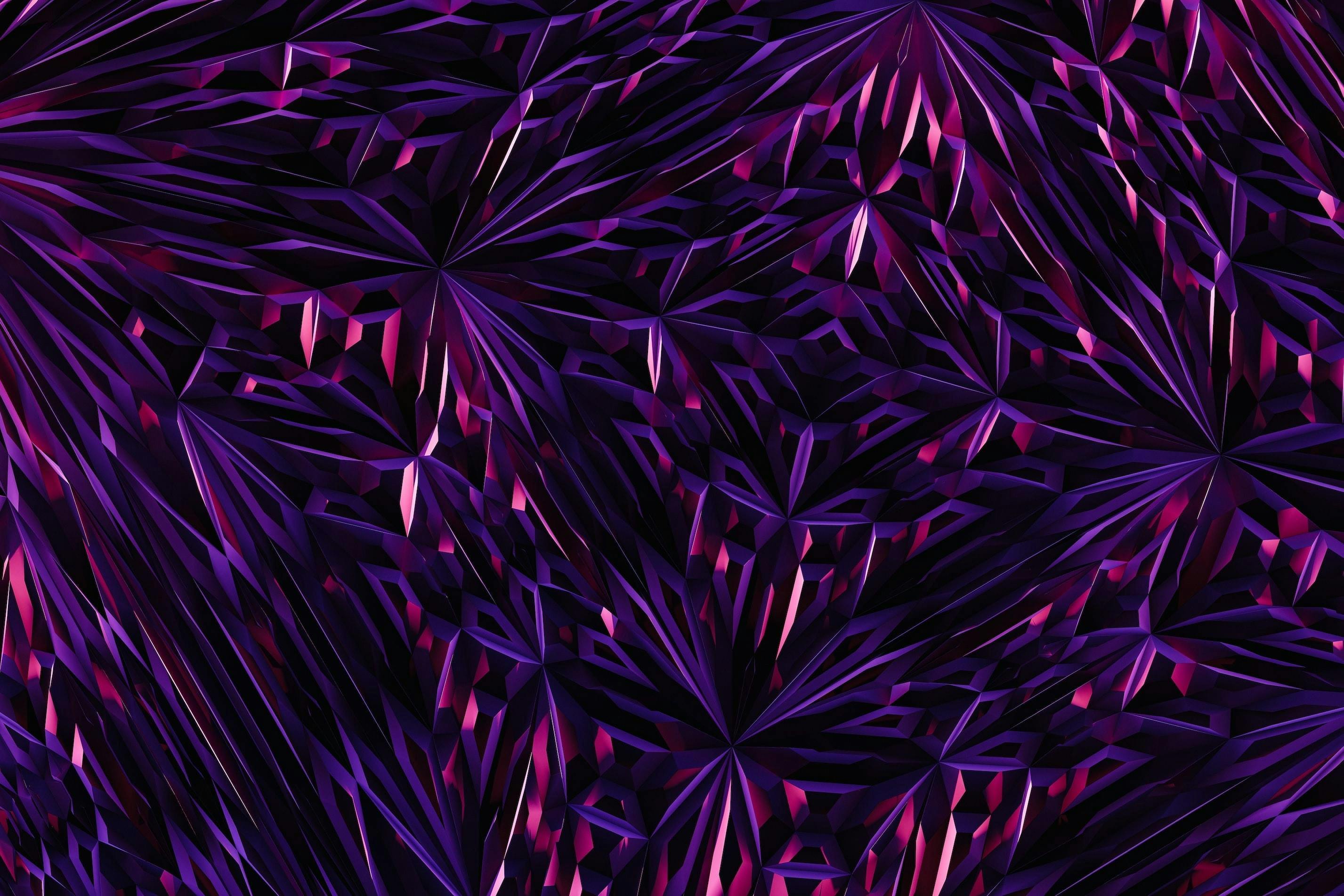 Abstract patroon in roze en paars tegen een zwarte achtergrond