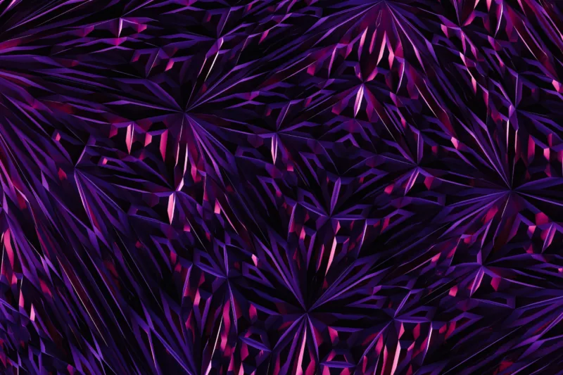 Abstract patroon in roze en paars tegen een zwarte achtergrond